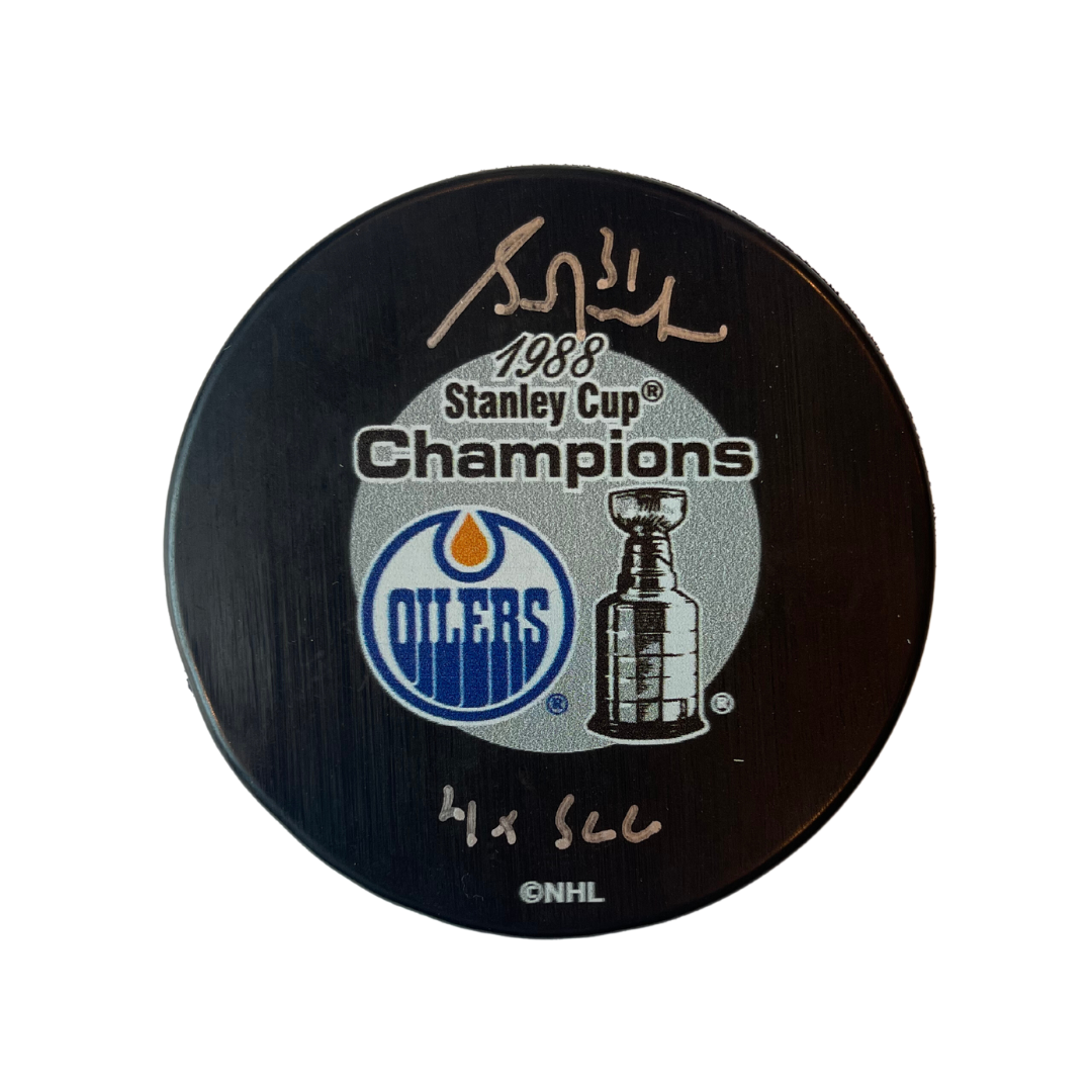 Grant Fuhr Edmonton Oilers Autographed 1990 Oilers Stanley Cup Puck w/ "4x SCC" Inscription - Fan Cave COA